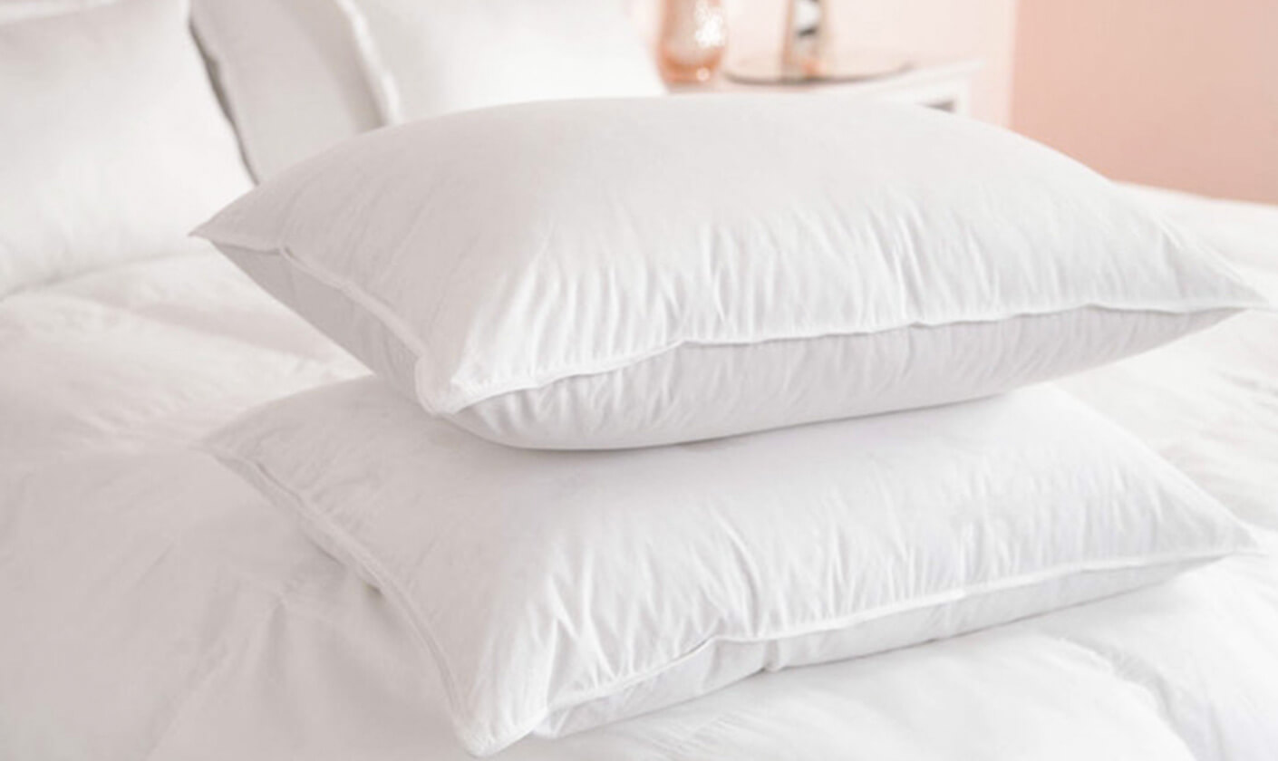 Plush pillows that provide perfect support, adding comfort and style to your bed.